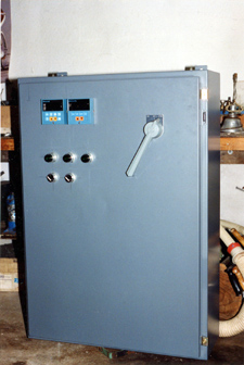 The cover of the control box of a small 60 KW furnace.